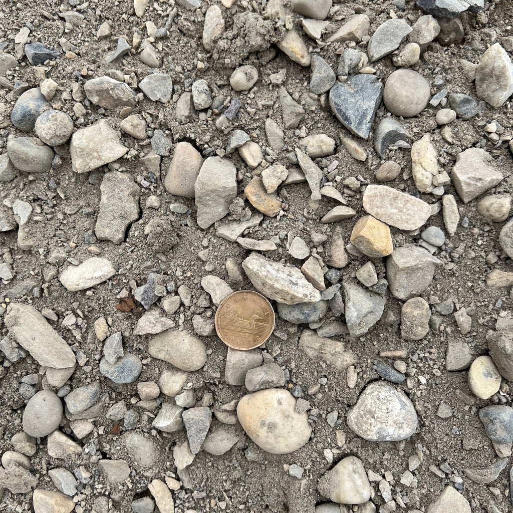 25mm Road Crush Calgary – 25mm road crush gravel with a blend of crushed rock and fines for pathways, driveways, parking pads, shed bases, and compacted landscape base applications. Bulk loose delivery available throughout Calgary and surrounding areas. Order online.